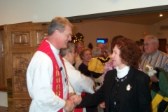 Pastors greet the congregation 3